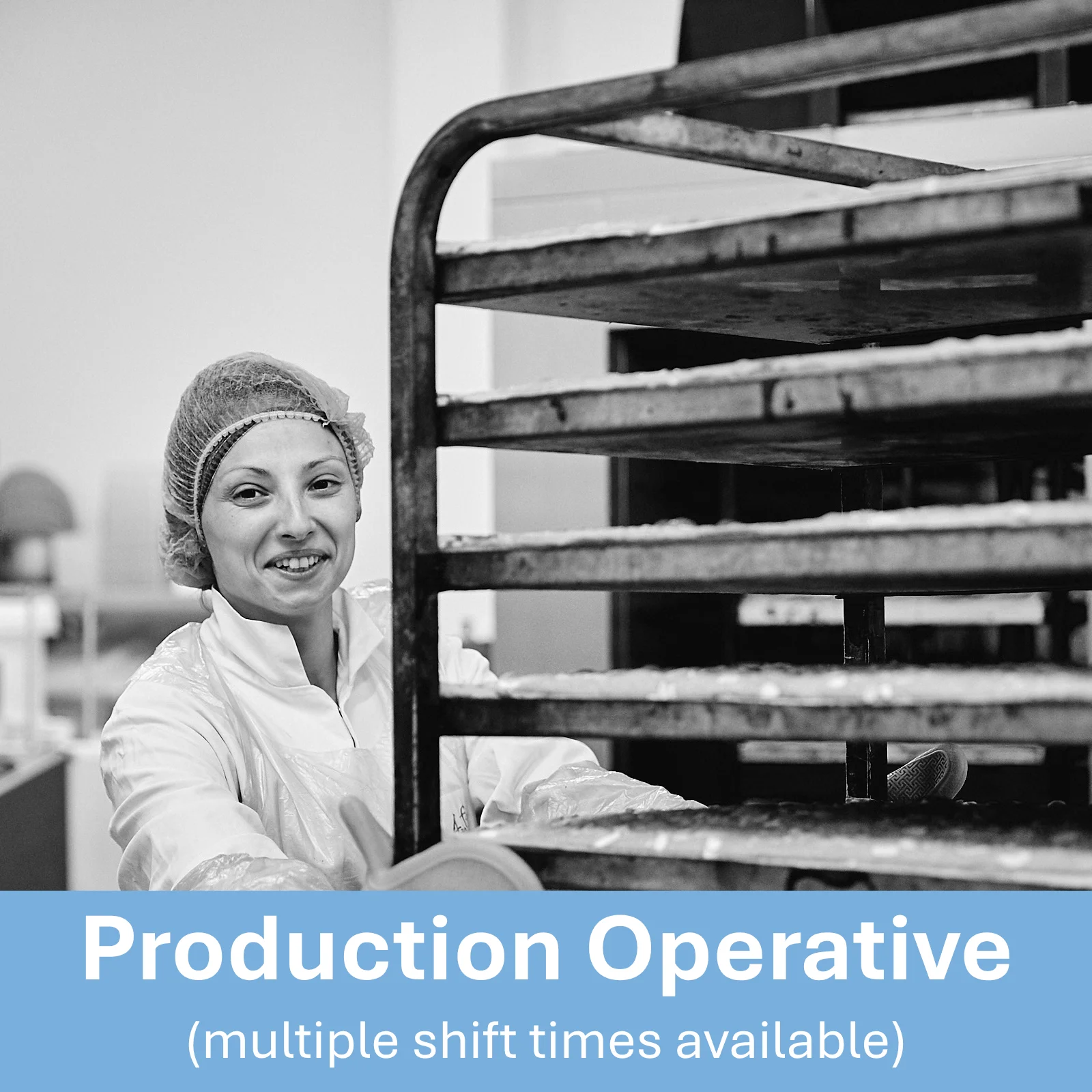 Black and white photo of a woman in hairnet and bakery uniform wearing overn gloves, holding onto a large rack of baked goods. Text underneath reads Production Operative